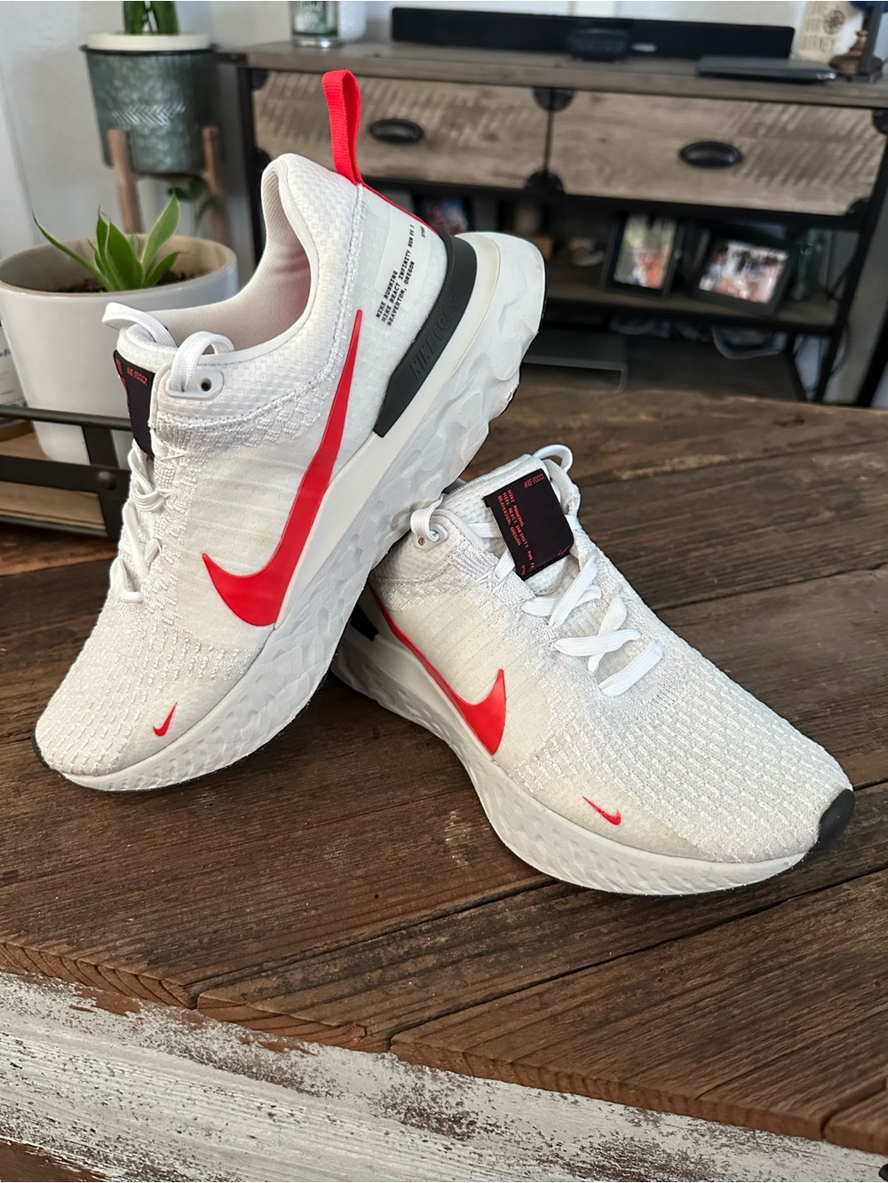 Nike White Knit Running Sneakers with Bright Red Swoosh